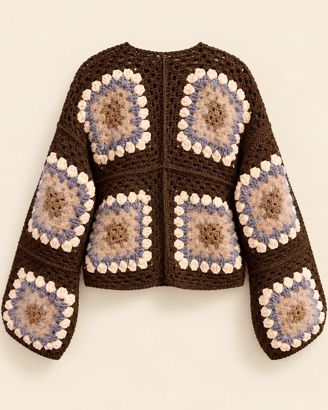 Back view of the Cocoa Bloom crochet cardigan with four floral granny squares on the cocoa brown body