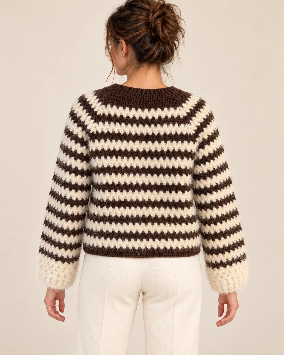 Model wearing the Cocoa Stripe Cotton Pullover, back view showing the striped body and cropped length